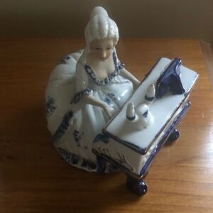 Porcelain Figurine with Blue Accents